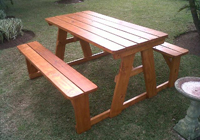 Hybrid dressed and oiled school picnic tables for sheltered areas.